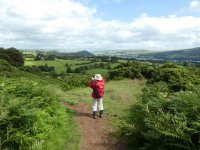 Helena takes a picture of Watermillock church and Dunmallard Hill