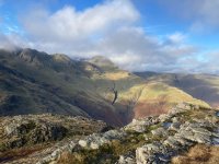 View to Cringle Crags and Bowfell from the top of Pike of Blisco