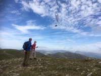 Admiring the paraglider on top of the Old Man of Coniston