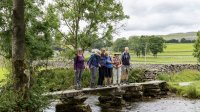 Crossing Austwick Beck at Flascoe Bridge